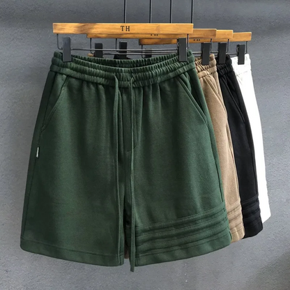 Men's Legacy striped heavyweight comfort shorts in blue/white. Ideal for casual, lounge, or athletic wear.