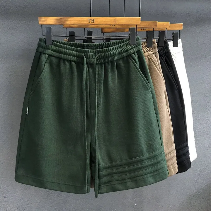 Men's Legacy striped heavyweight comfort shorts in blue/white. Ideal for casual, lounge, or athletic wear.