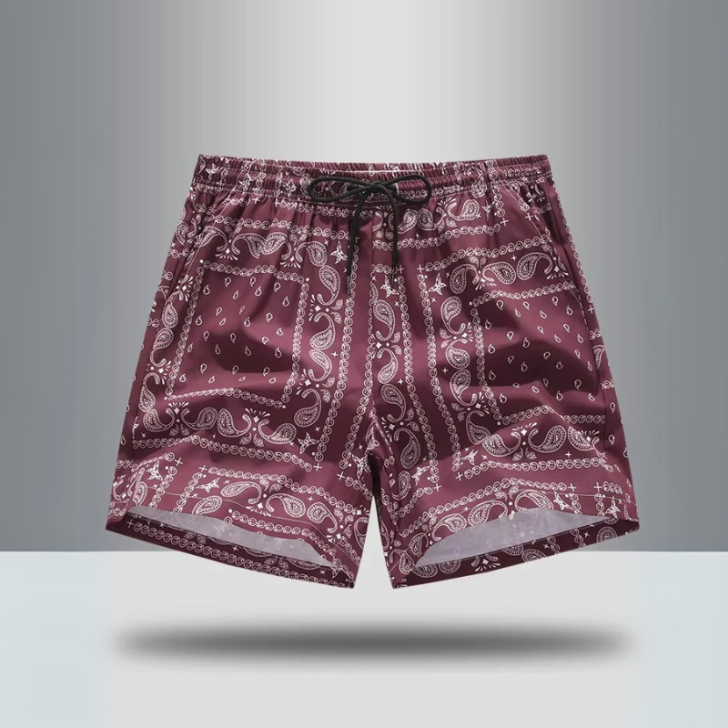 Retro men's athletic shorts featuring a vibrant paisley print for activewear or casual streetwear.