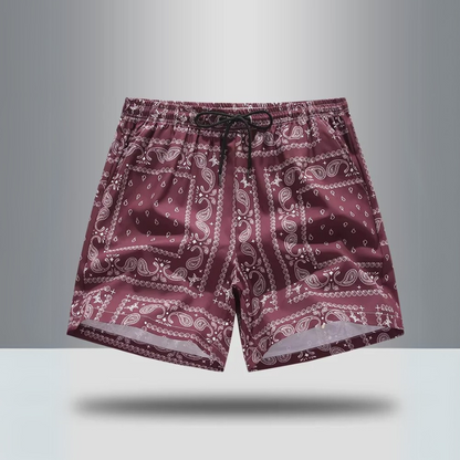 Retro men's athletic shorts featuring a vibrant paisley print for activewear or casual streetwear.