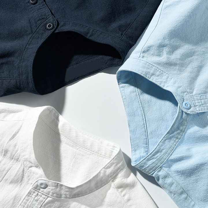 Dark blue men's relaxed fit Sardinia Coastal Comfort Shirt, versatile button-down for resort wear.
