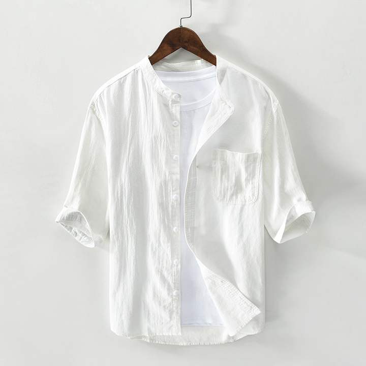 Men's casual light blue Sardinia Coastal Comfort Shirt, relaxed fit button-down for summer resort trips.