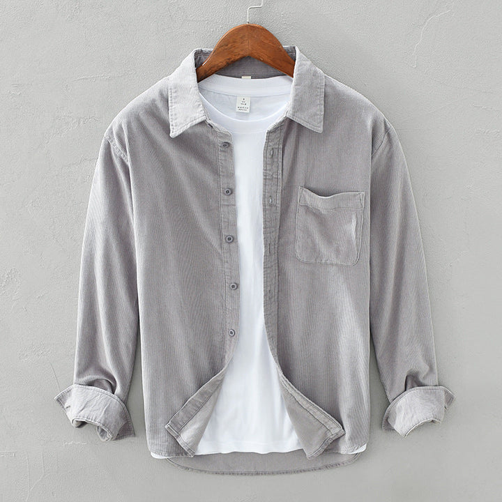 Versatile brown men's casual shirt, a long-sleeve button-up top with a chest pocket for everyday layering.