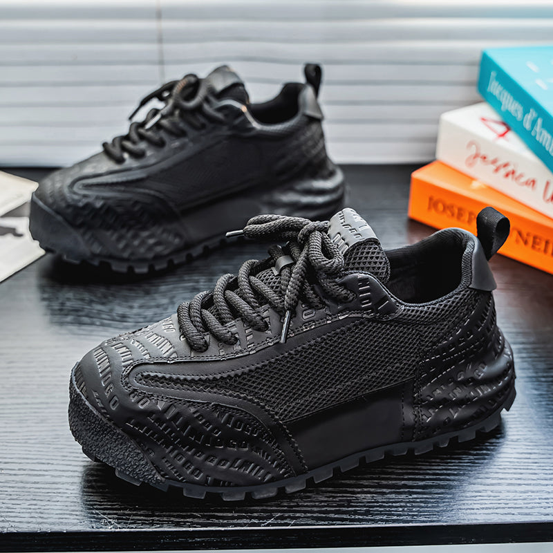 Lightweight men's running shoes, offering superior comfort and grip for peak athletic performance.