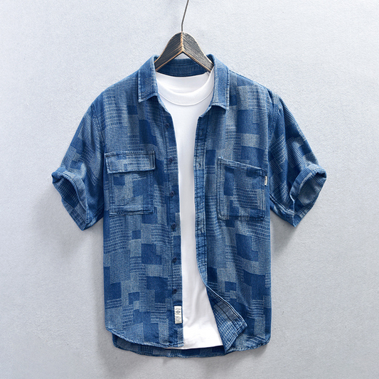 Men's lightweight blue denim shirt with double pockets, perfect for casual summer style & comfort.