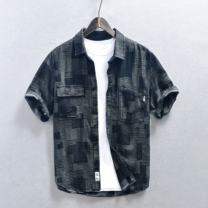 Black men's lightweight denim shirt. Casual double pocket design for effortless summer comfort & style.