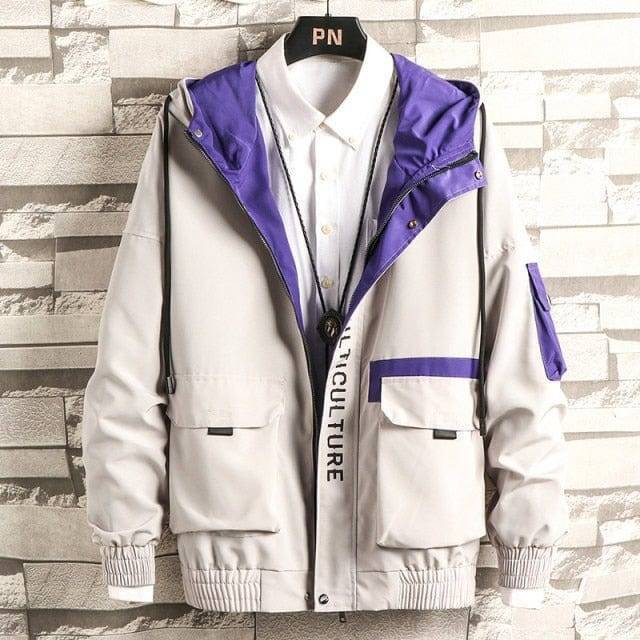 Detail of zipper and snap button closure on a men's lightweight bomber cargo jacket