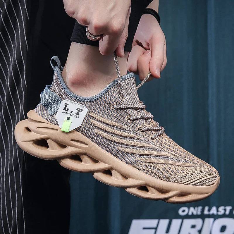 Close-up of men's lightweight athletic footwear, highlighting the breathable mesh upper and sole.