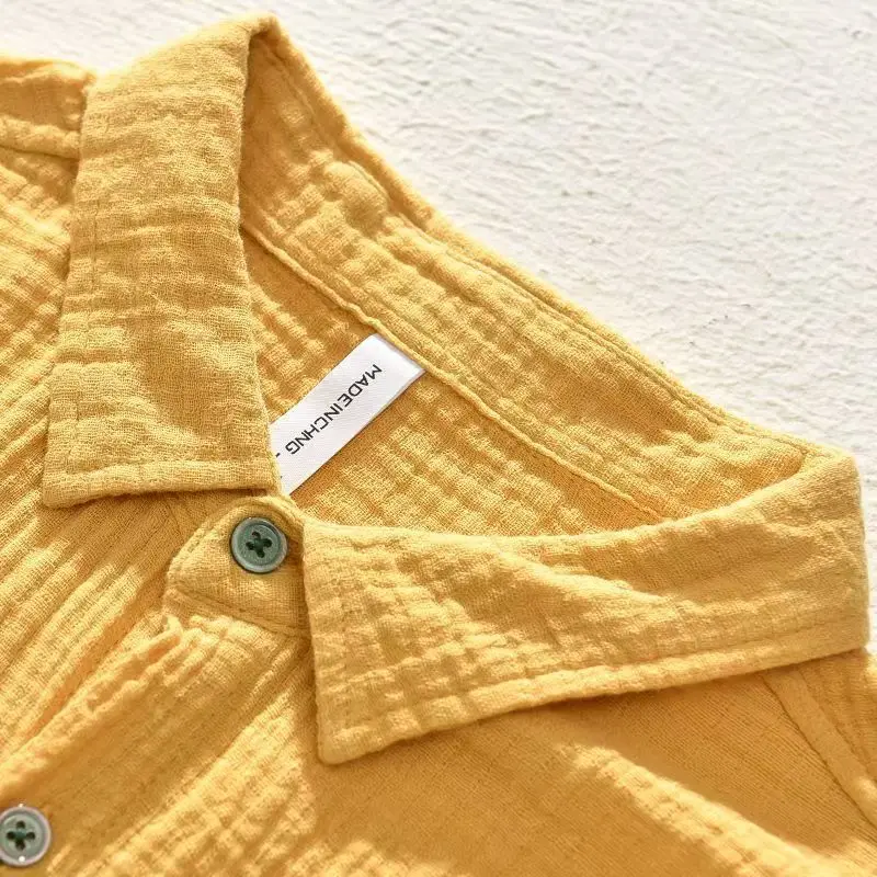 Essential men's summer shirt: a lightweight, breathable, short sleeve casual button-up.