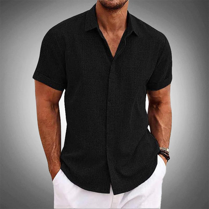 Men's wrinkle-resistant short-sleeve top. Lightweight, breathable & perfect for travel or casual summer outfits.