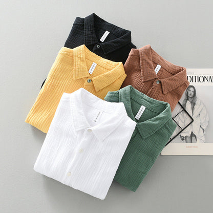 Versatile men's casual top, a breathable short sleeve button-up for daily and vacation wear.