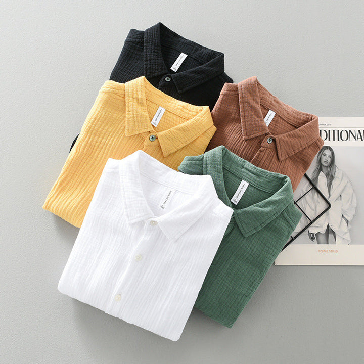 Versatile men's casual top, a breathable short sleeve button-up for daily and vacation wear.