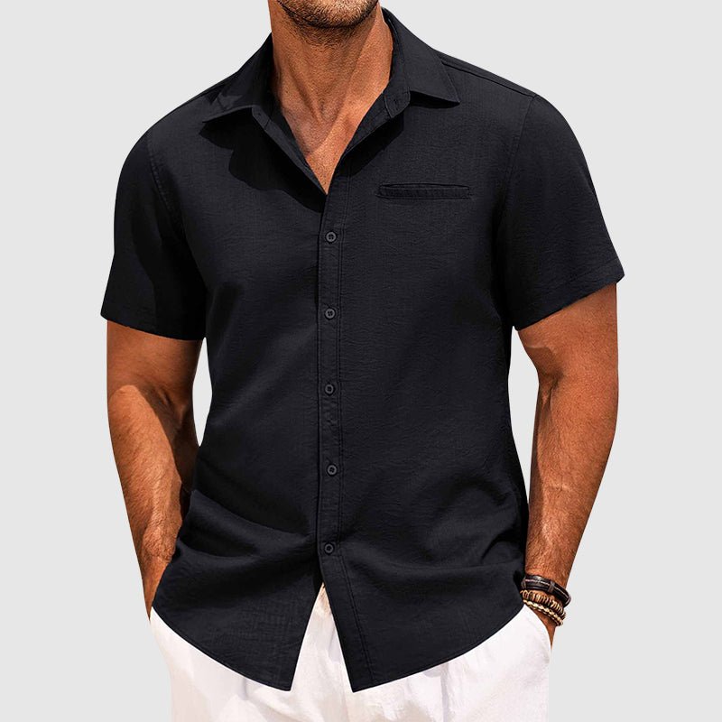 Modern men's button-down summer shirt, short sleeve, with a stylish chest pocket; perfect for versatile warm-weather outfits.