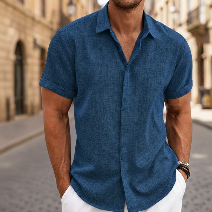 Lightweight men's short sleeve button-front polo shirt. Versatile menswear for comfortable summer fashion.