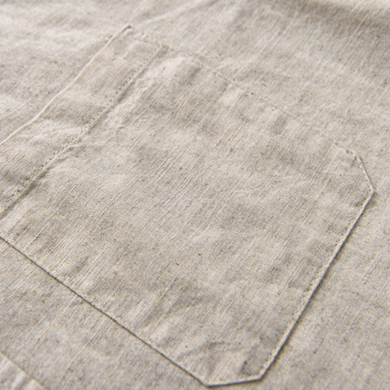 Stylish men's lightweight button-up shirt, versatile for casual summer looks.