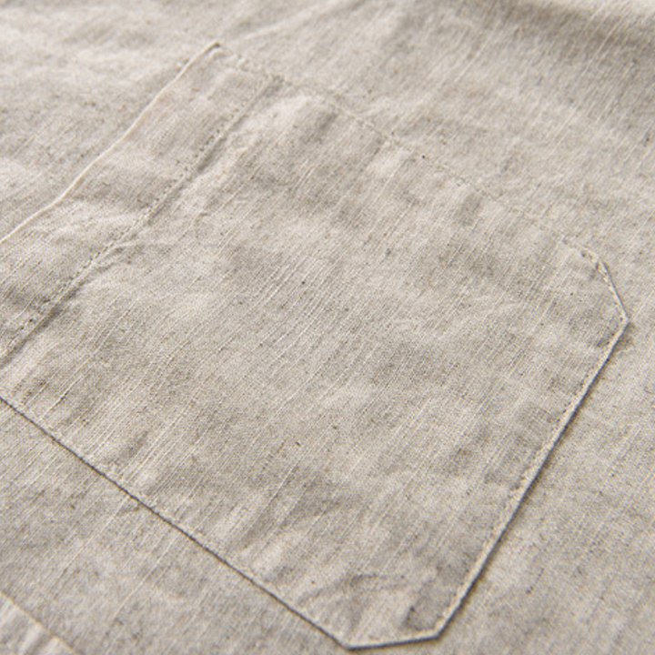 Stylish men's lightweight button-up shirt, versatile for casual summer looks.
