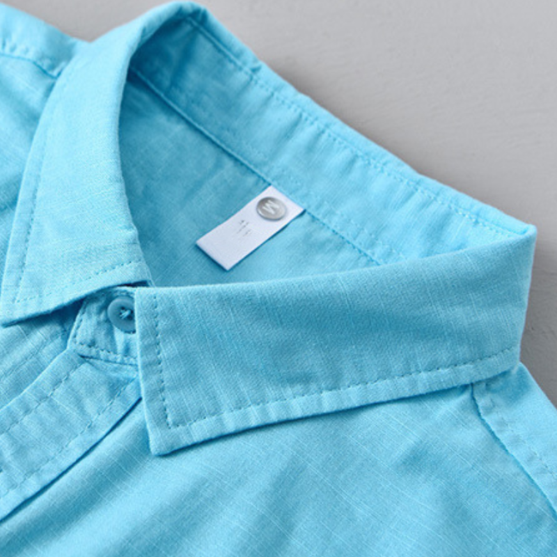 Lightweight men's button-up shirt, relaxed fit, a staple for summer style.