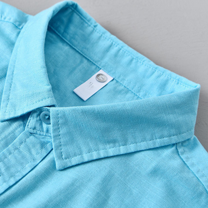 Lightweight men's button-up shirt, relaxed fit, a staple for summer style.