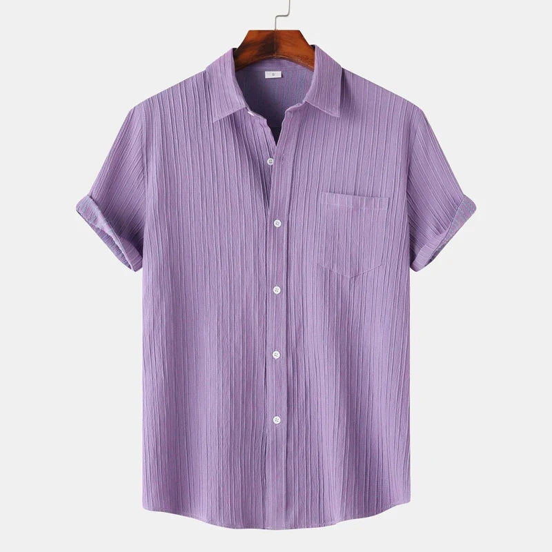Men's lightweight coastal button-down shirt. Classic fit, short-sleeve, ideal for summer casual & resort wear.