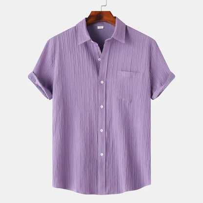 Men's lightweight coastal button-down shirt. Classic fit, short-sleeve, ideal for summer casual & resort wear.