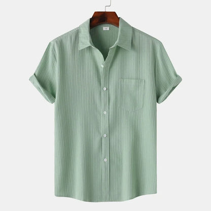 Smart casual men's lightweight button-down shirt. Coastal-inspired, spread collar, great for summer outings.