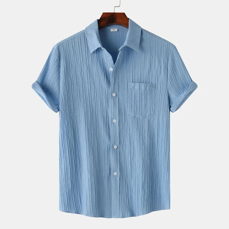 Breathable men's lightweight coastal button-down shirt. Classic fit for comfortable summer days & resort fashion.