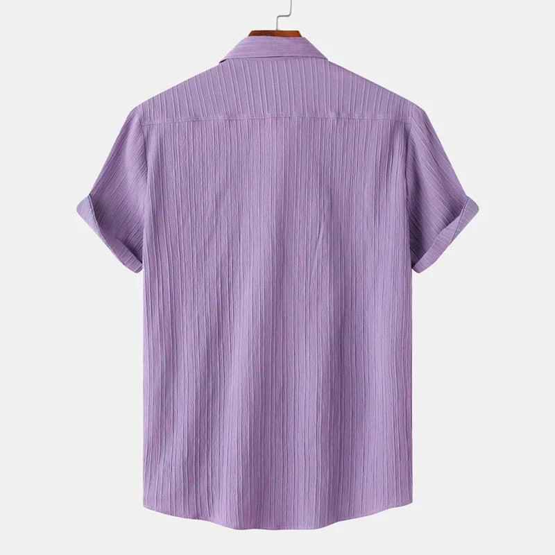 Comfortable men's lightweight coastal button-down shirt with a spread collar. Perfect for summer fashion.