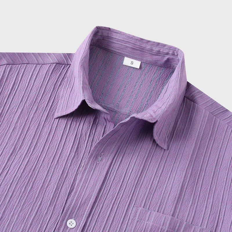 Versatile men's short-sleeve button-down shirt. Lightweight coastal style for casual summer days & evenings.