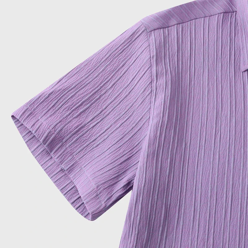 Classic fit men's lightweight coastal shirt. Breathable fabric, ideal button-down for hot weather resort wear.