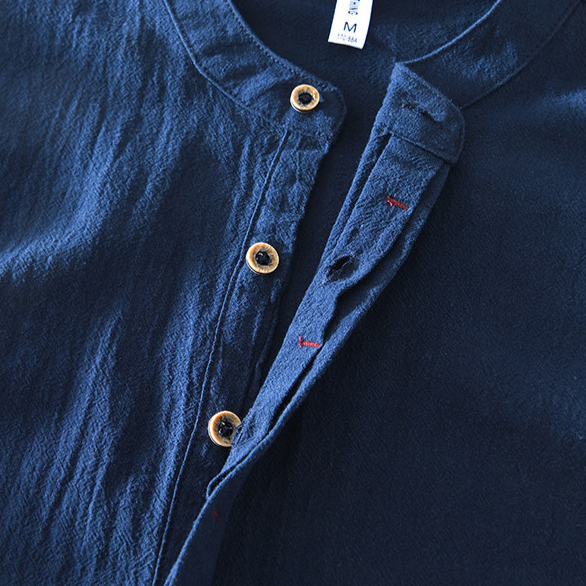 Relaxed men's beach shirt: lightweight, collarless popover with long sleeves. Perfect for summer vacation outfits.