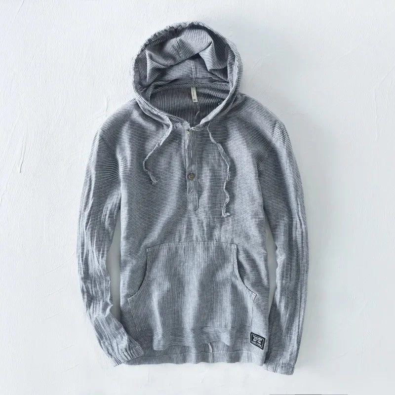 Casual men's lightweight hoodie with a relaxed fit, a versatile layering piece for men's fashion.