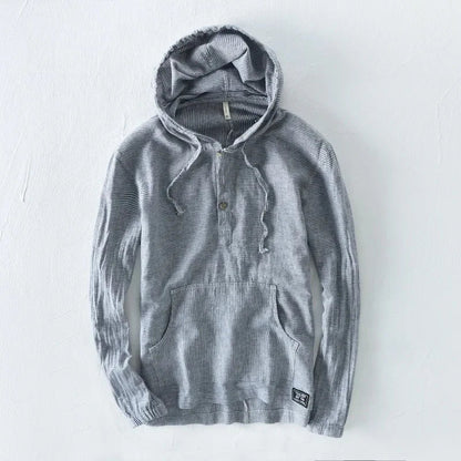 Casual men's lightweight hoodie with a relaxed fit, a versatile layering piece for men's fashion.