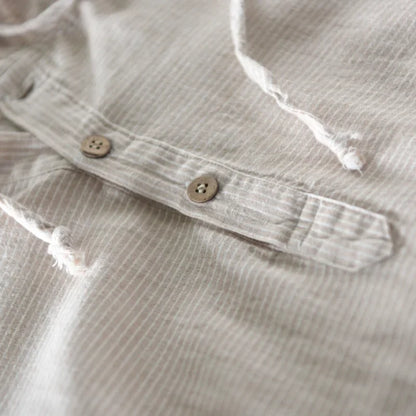 Modern men's lightweight hoodie, a comfortable layering piece for casual spring and summer outfits.