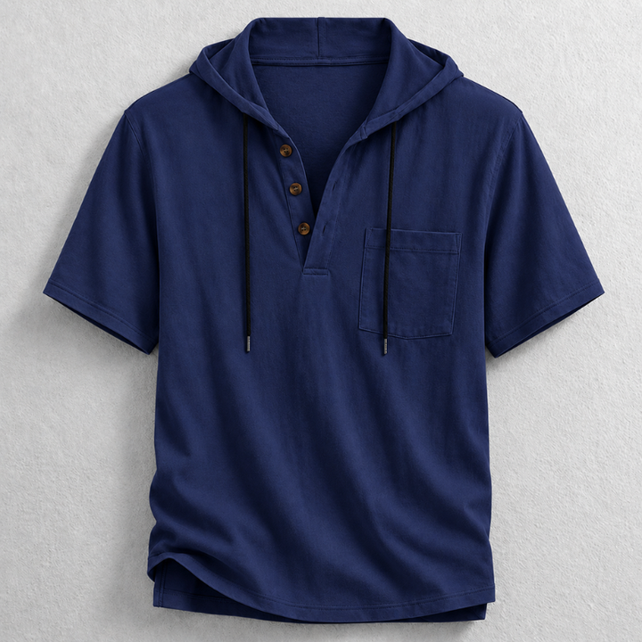 Detail of the hood and button placket on a men's lightweight cotton-linen long sleeve henley.