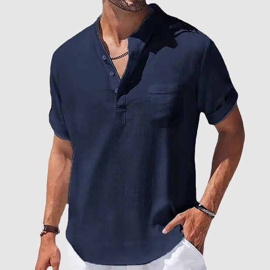 Men's lightweight dark blue henley shirt. Casual short sleeve top with button placket & chest pocket for everyday wear.