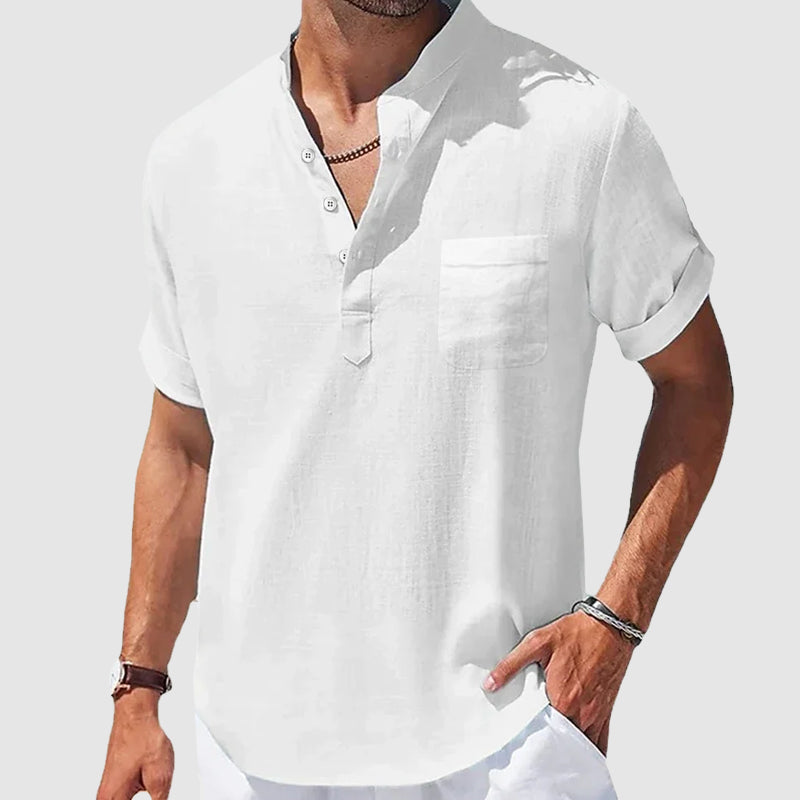 White men's everyday henley. Versatile short sleeve shirt with classic button placket & chest pocket detail.