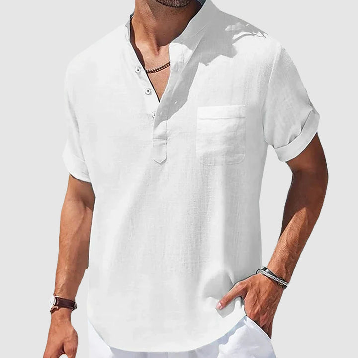 White men's everyday henley. Versatile short sleeve shirt with classic button placket & chest pocket detail.