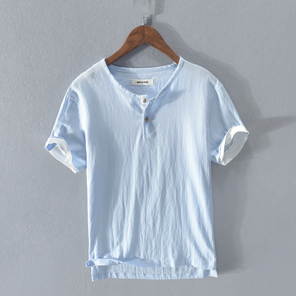 Men's stylish white lightweight Henley shirt, a breathable short sleeve top for comfortable summer casual fashion.
