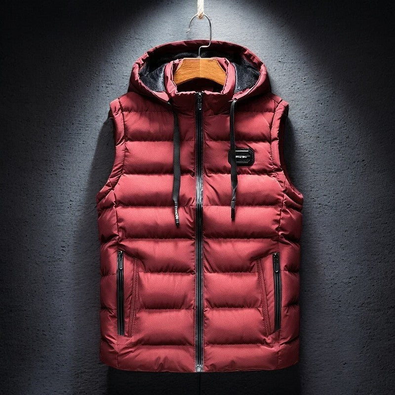 Men's lightweight insulated hooded puffer vest, ideal for cold weather layering and active outdoor use.