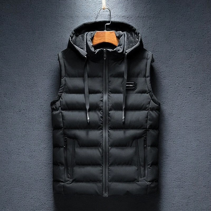 Warm men's sleeveless insulated jacket. This hooded puffer vest is great for layering in cold weather or activewear.