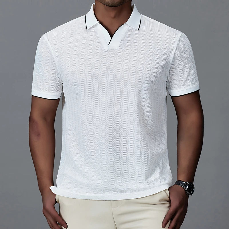 Lightweight black knitted polo for men. Short sleeve, perfect for casual summer style and comfort.