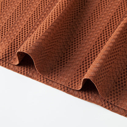 Breathable sienna knitted polo shirt for men. Short sleeve, perfect for warm weather and everyday wear.