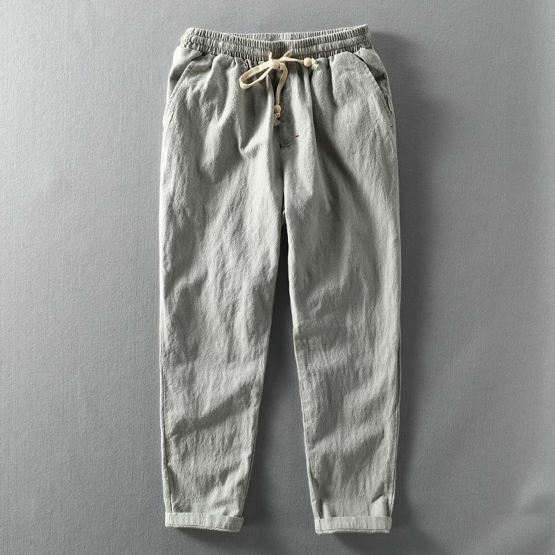 Lightweight and breathable men's linen trousers, relaxed fit for ultimate summer comfort.