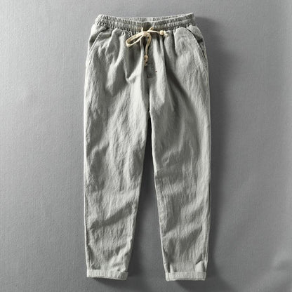 Lightweight and breathable men's linen trousers, relaxed fit for ultimate summer comfort.