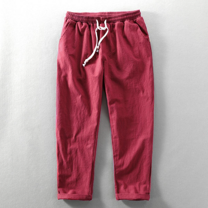Comfortable men's relaxed fit linen pants, lightweight and breathable, perfect for summer.