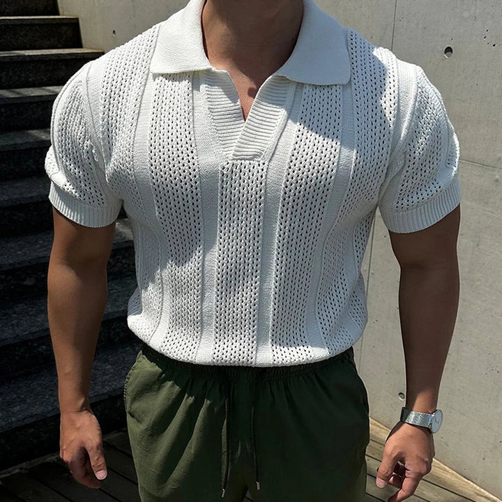 Stylish men's fitted mesh polo shirt. Features a vintage lapel, perfect for contemporary men's casual wear.