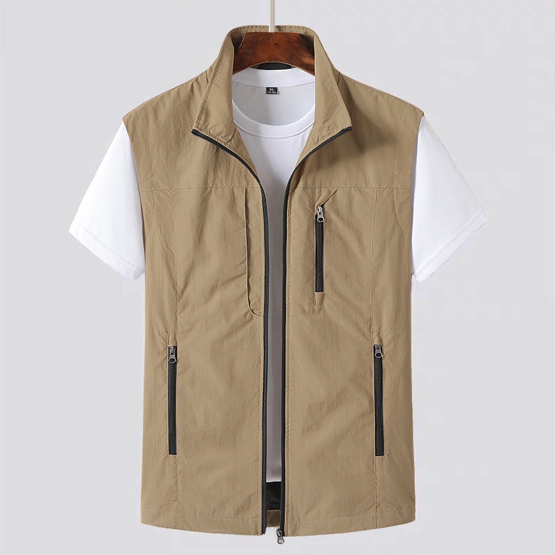 Practical men's utility vest, lightweight and durable, offering ample storage for travel, work, or daily essentials.