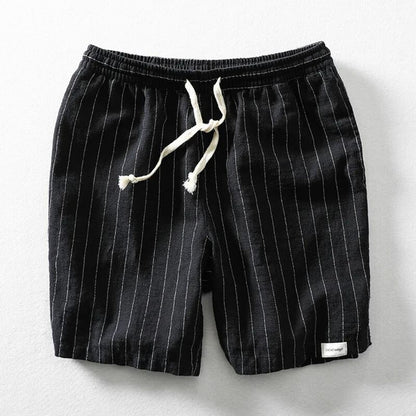 Man wearing comfortable, lightweight pinstripe casual shorts for men, ideal for summer outdoor activities.