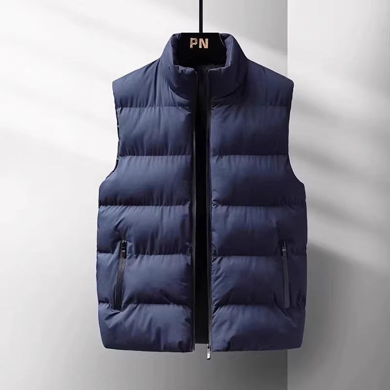 Comfortable men's sleeveless puffer vest, perfect for layering. Versatile outerwear for casual outings & active lifestyles.