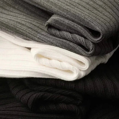 Men's long sleeve lightweight ribbed knit polo. Soft, breathable cotton blend for comfortable, tailored fit.